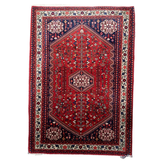 Antique Persian Qashqai rug 1920s hand-knotted wool 3.5x5 ft full view with hexagonal medallion

