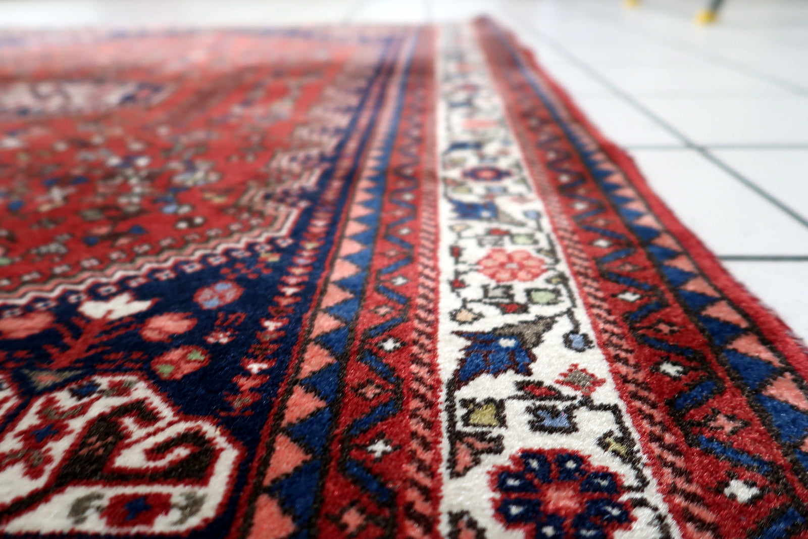 Antique Persian Gashkai rug design elements featuring strong visual rhythm and tribal artistry
