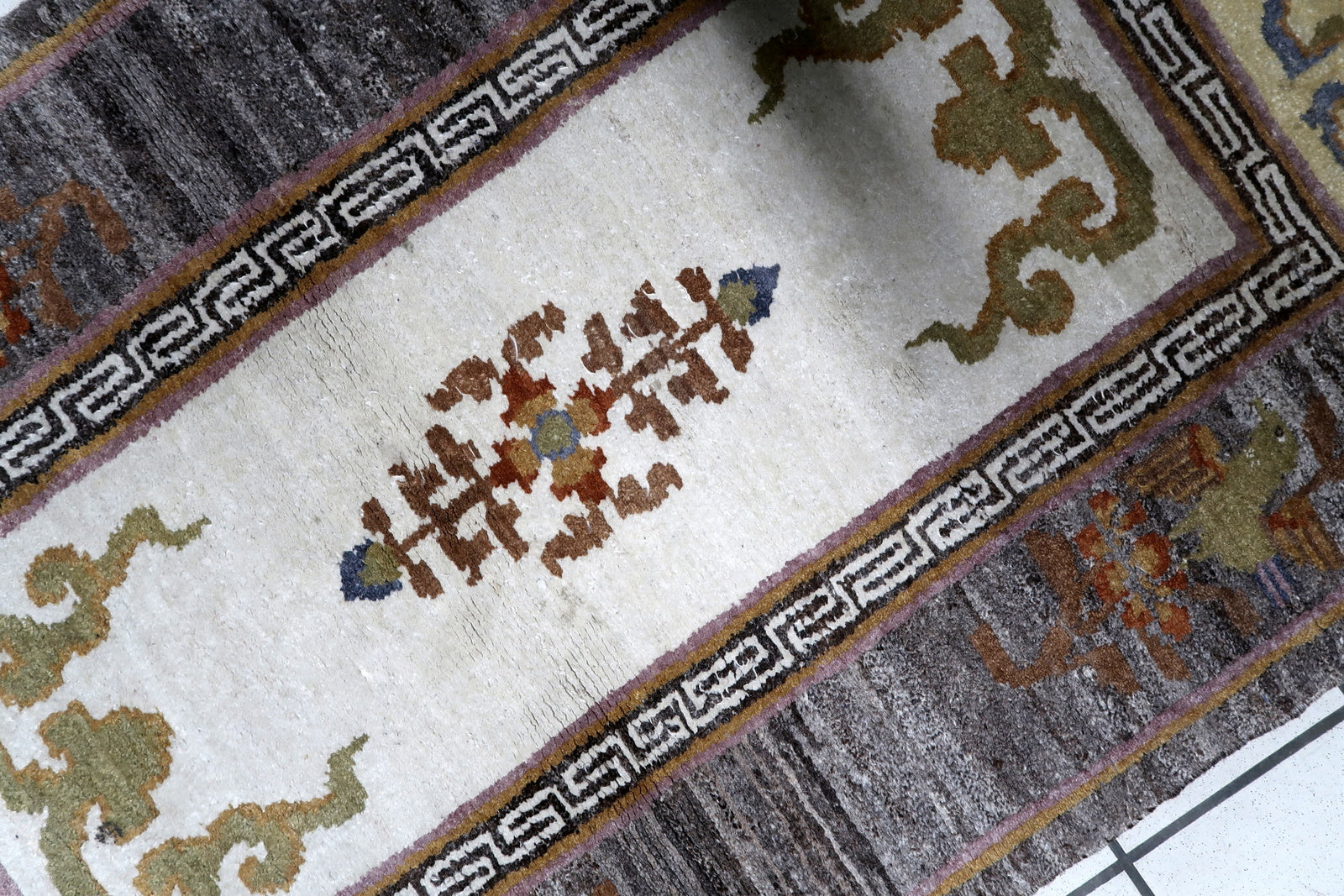 Vintage Tibetan rug texture and thick highland wool pile detail with beautiful abrash variations

