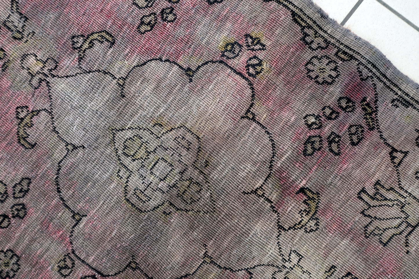 Close-up of authentic 1940s Turkish fragment showcasing visible history and charming irregularities

