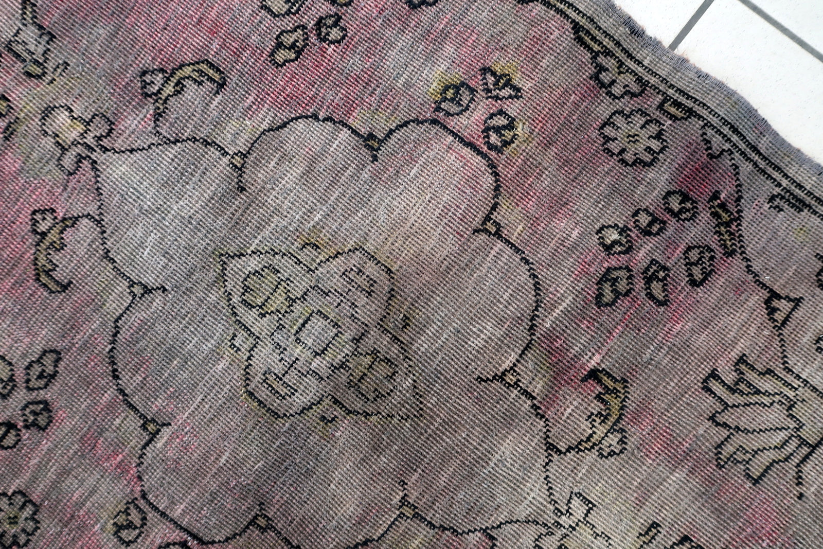 Close-up of authentic 1940s Turkish fragment showcasing visible history and charming irregularities

