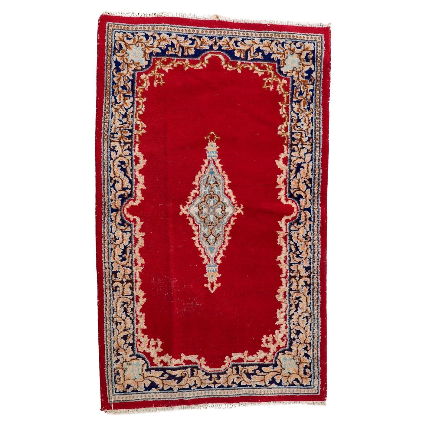 Vintage Persian Kerman rug 1950s hand-knotted wool 2.11x4.11 ft full view with classic central floral medallion on cream field

