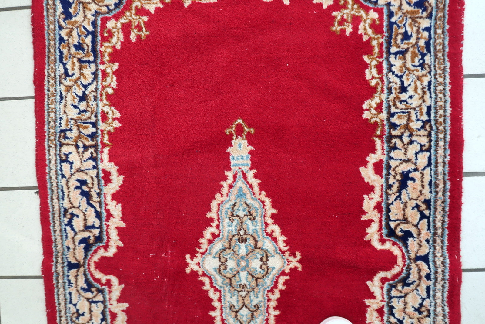 Elegant Persian scatter rug ideal for living room with velvet sofas or study in interior setting

