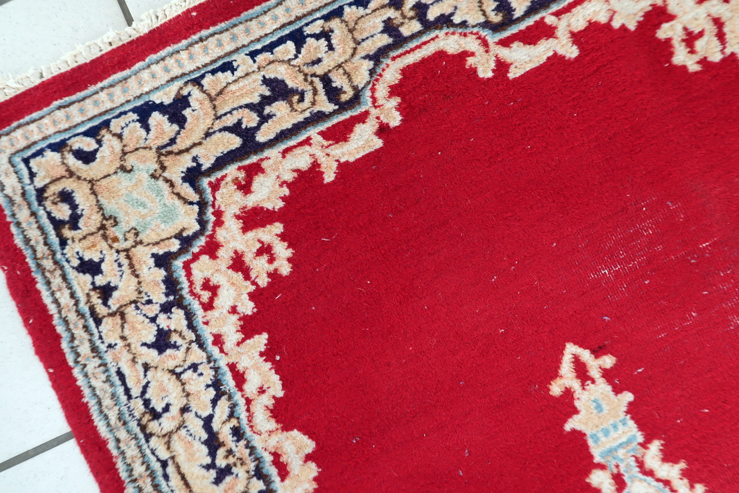 7. Classic central medallion anchored by intricate open field with complex flowing floral patterns
