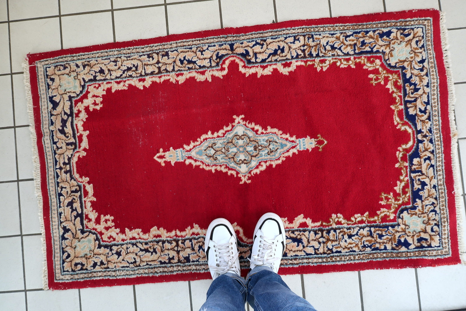 8. Close-up of blooming vines palmettes and delicate botanical details characteristic of Kerman weaving

