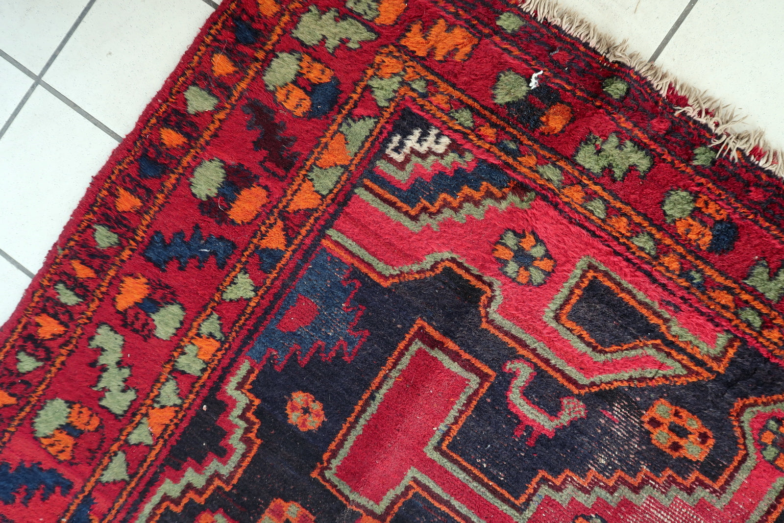 Antique wool Hamadan carpet, geometric tribal pattern from 1930s Persia