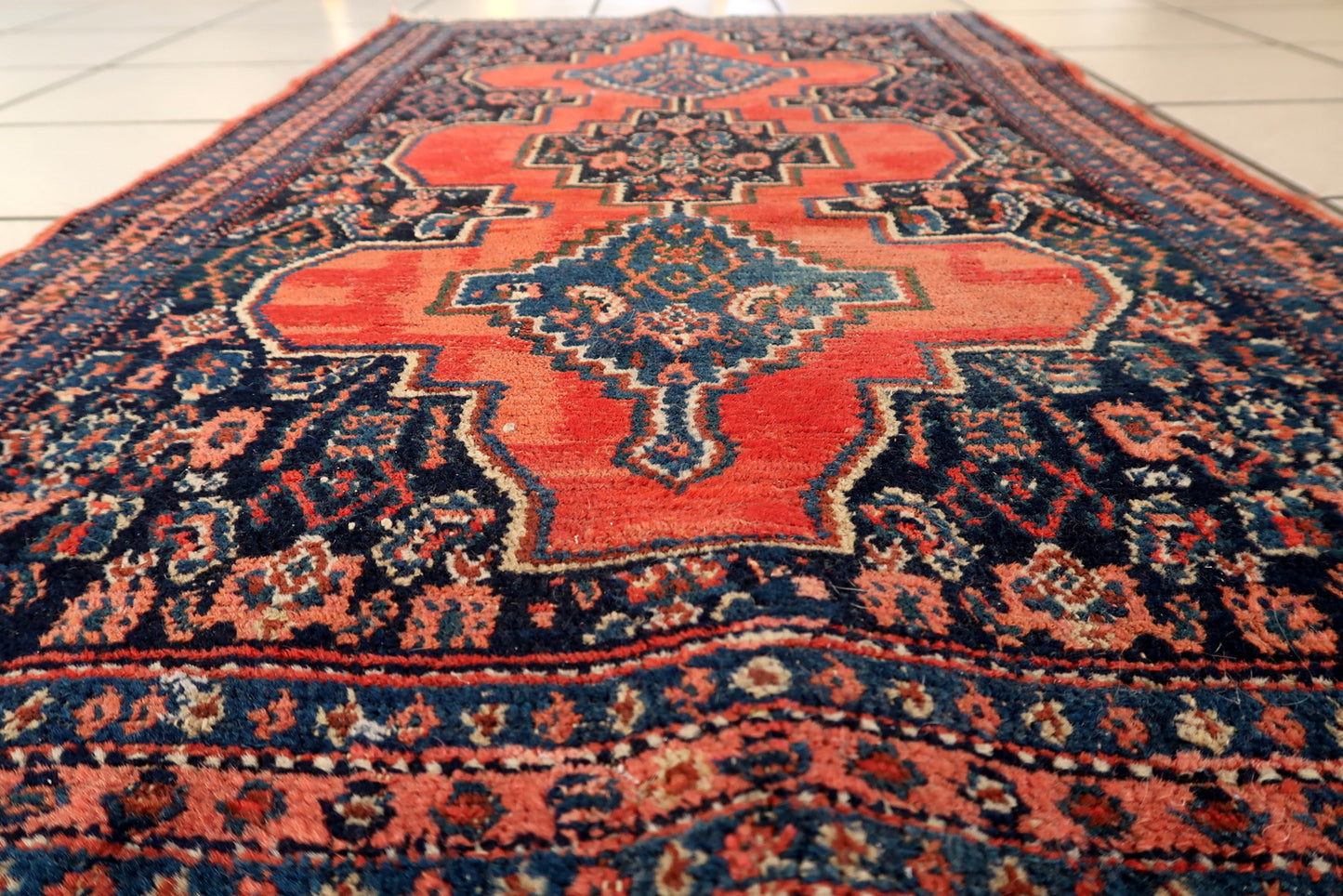 Hand-knotted Senneh rug from Sanandaj, 1920s Persian wool textile