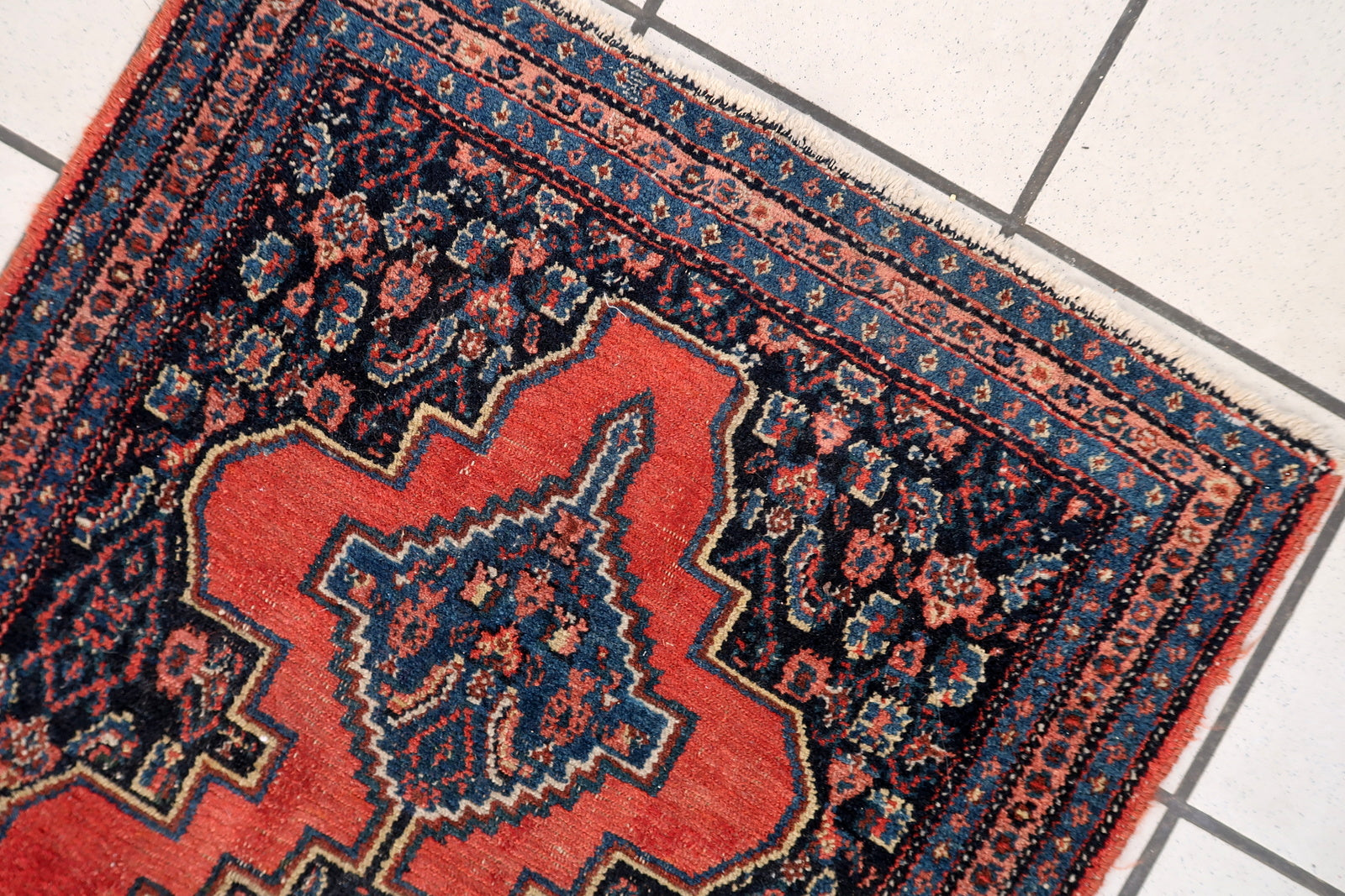 1920s Persian Senneh runner, narrow wool rug with intricate motifs