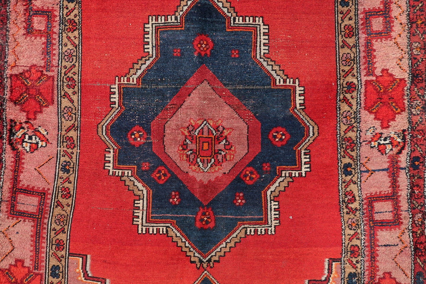 Hand-knotted Malayer rug detail, fine weave and geometric composition