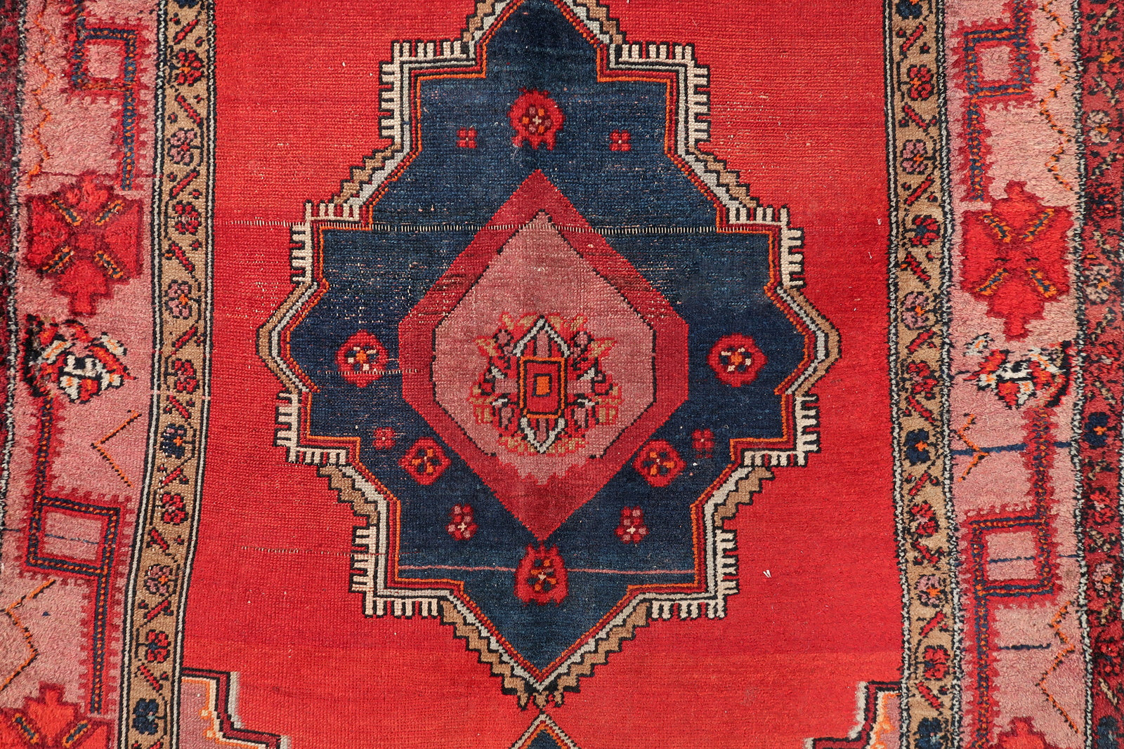 Hand-knotted Malayer rug detail, fine weave and geometric composition