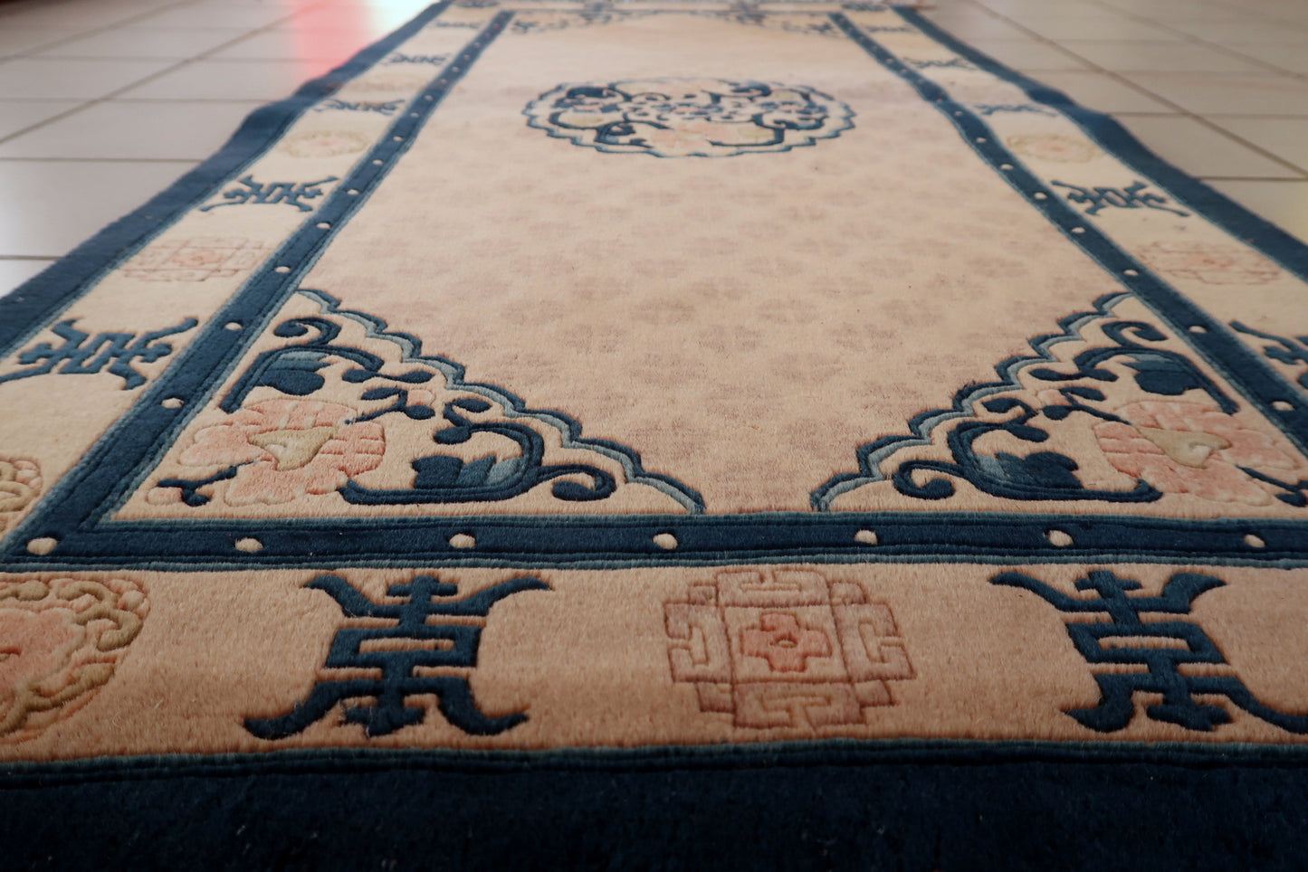 Vintage Chinese rug back view, revealing hand-knotted weaving structure