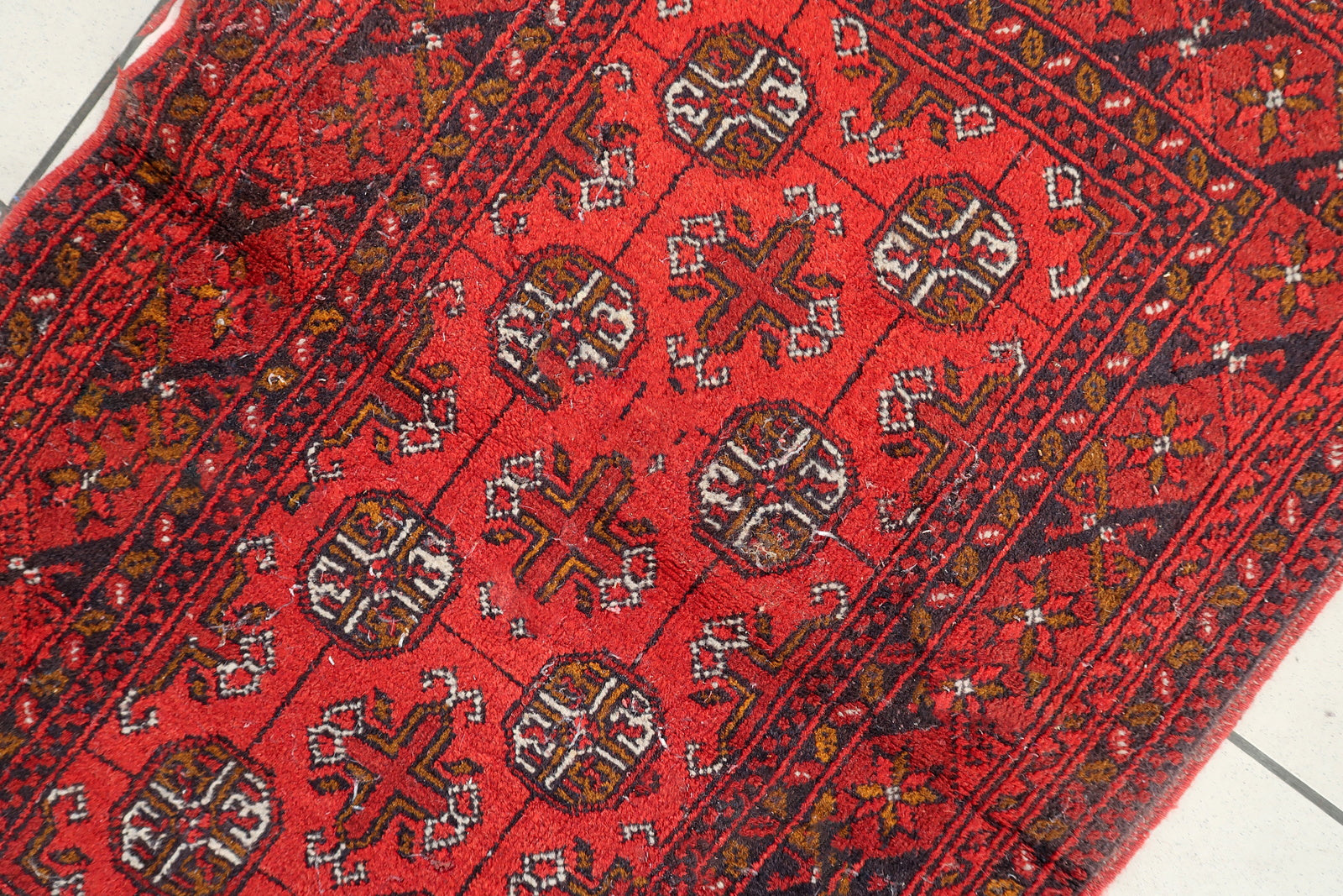 Ersari rug close-up, showing hand-spun wool texture and detailed knotting
