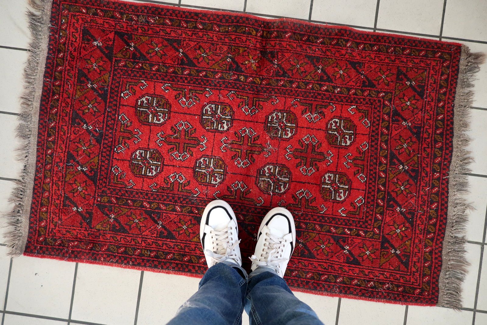 Hand-knotted Ersari rug detail, geometric motifs and natural dye colors