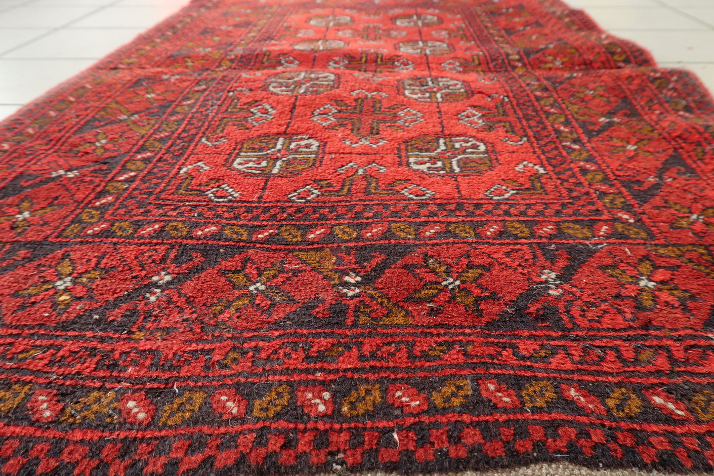 Antique Afghan Ersari carpet, deep red wool with traditional tribal layout