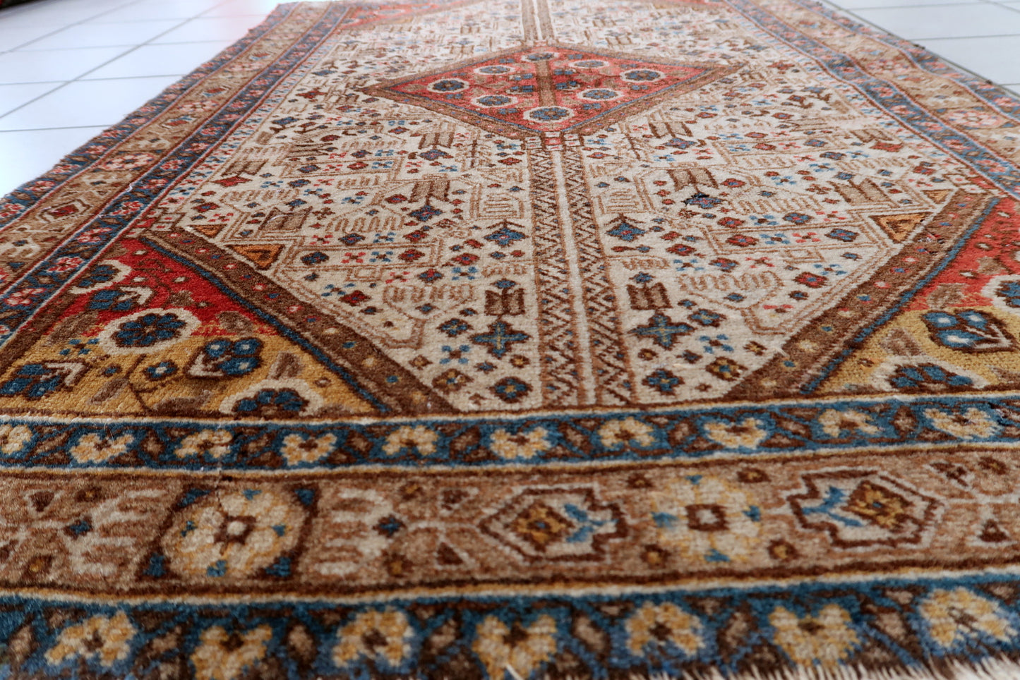 Malayer rug back view, showing hand-knotted structure and weave