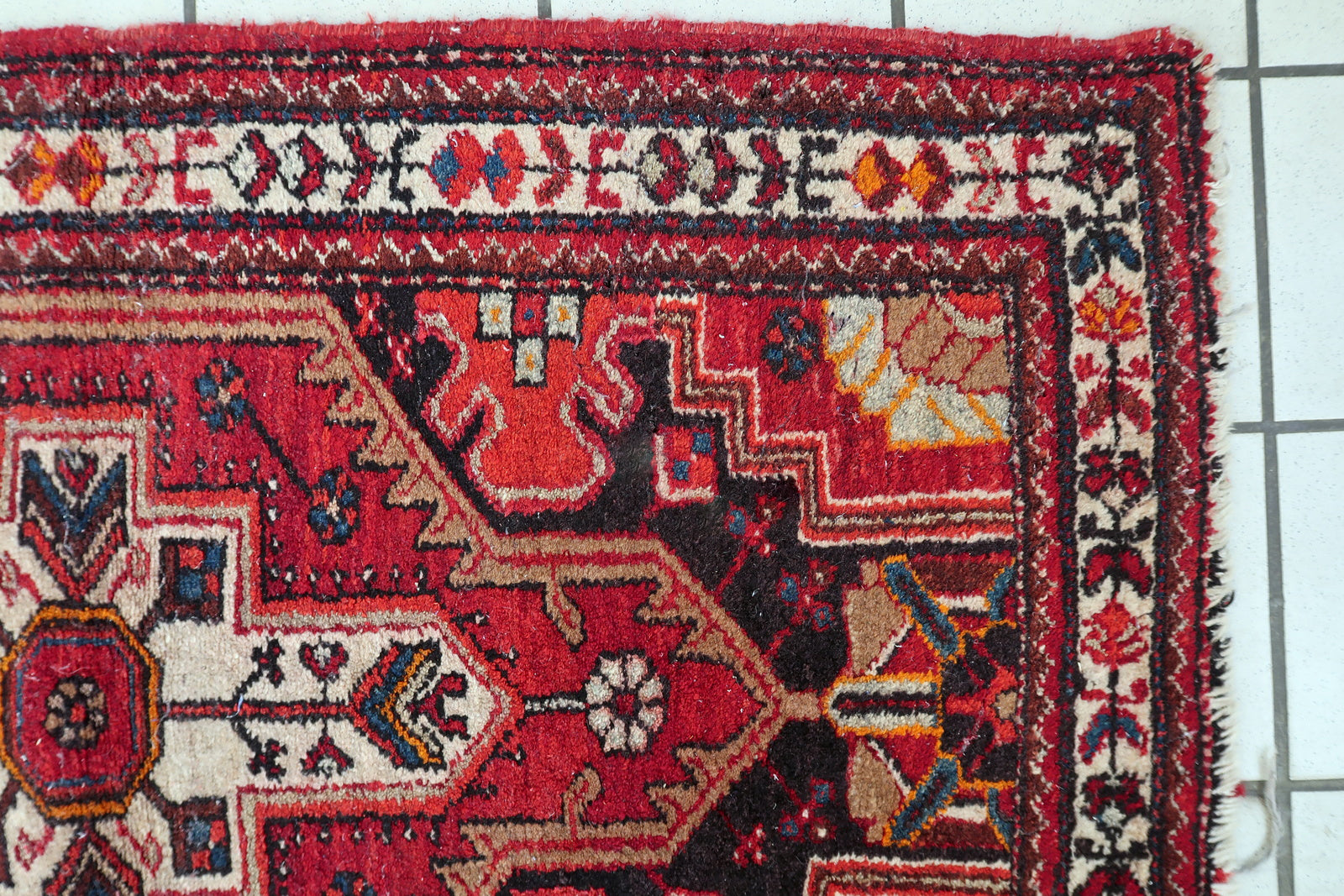 Vintage Persian Hamadan rug corner detail, showcasing craftsmanship and patina