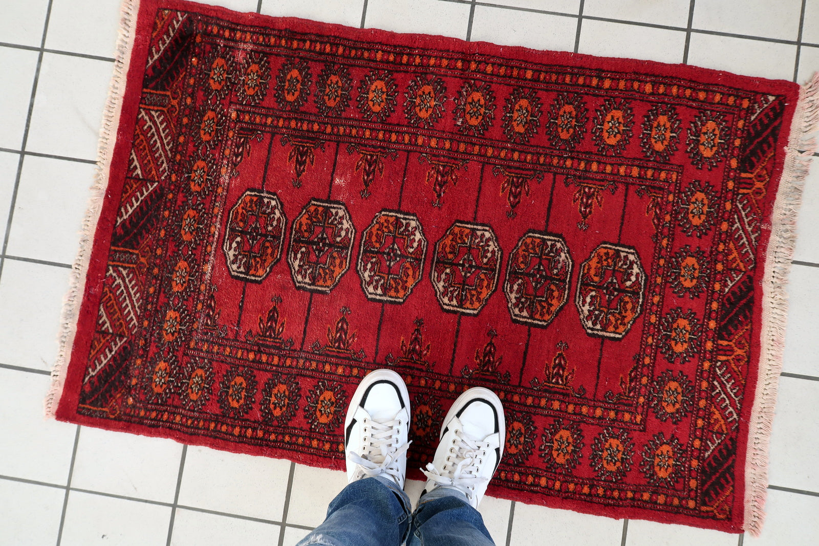 Hand-knotted Bukhara rug, vintage wool carpet with rich burgundy tones