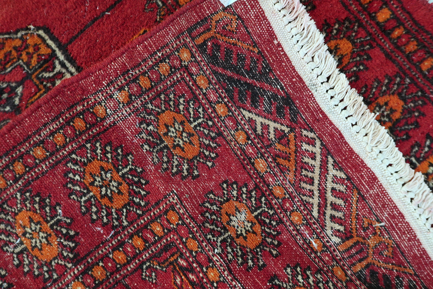 Vintage Uzbek tribal rug, Bukhara design with repeating geometric pattern