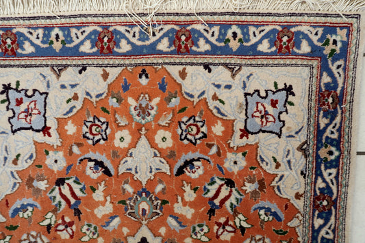 Persian Tabriz wool rug with silk accents, intricate floral design and soft sheen