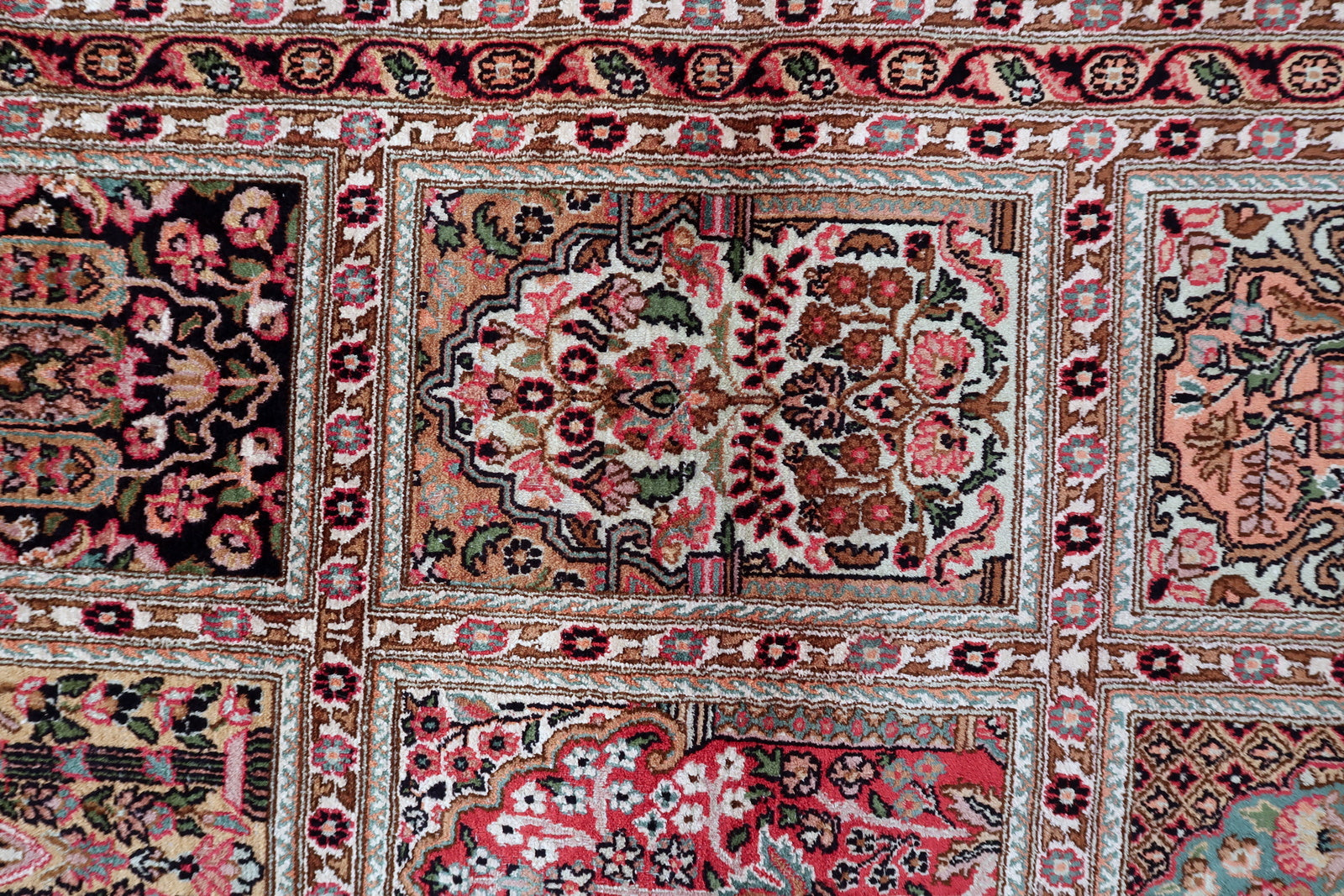 Vintage Qum silk carpet, floral medallion design with rich colors