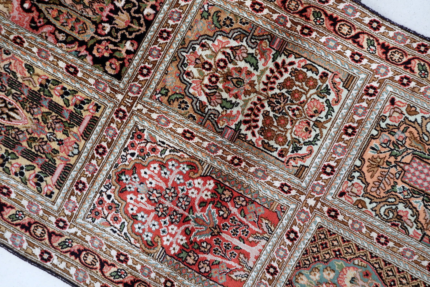 1950s Qum silk rug, fine weave with elegant curvilinear pattern