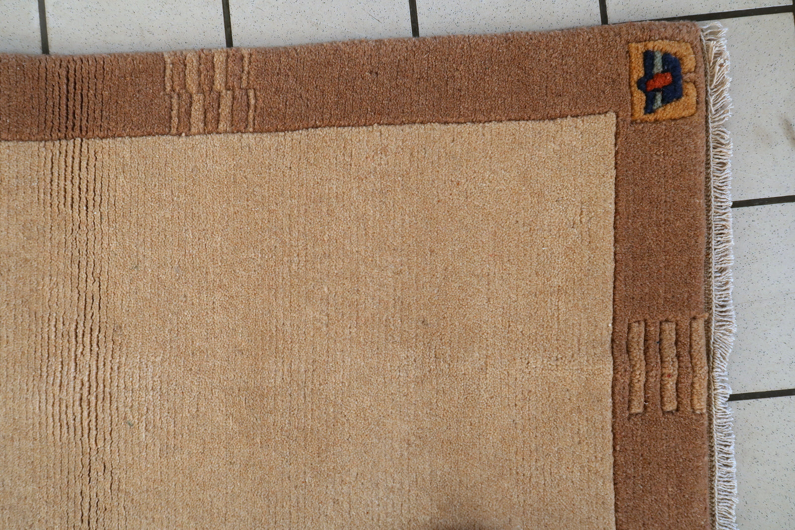 Tibetan Khaden rug back view, showing hand-knotted construction