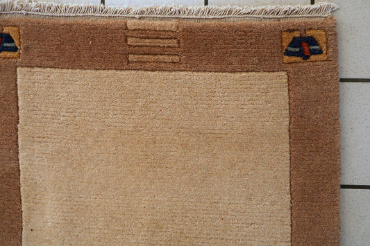 Tibetan Khaden wool rug full view, vintage hand-knotted carpet with simple layout