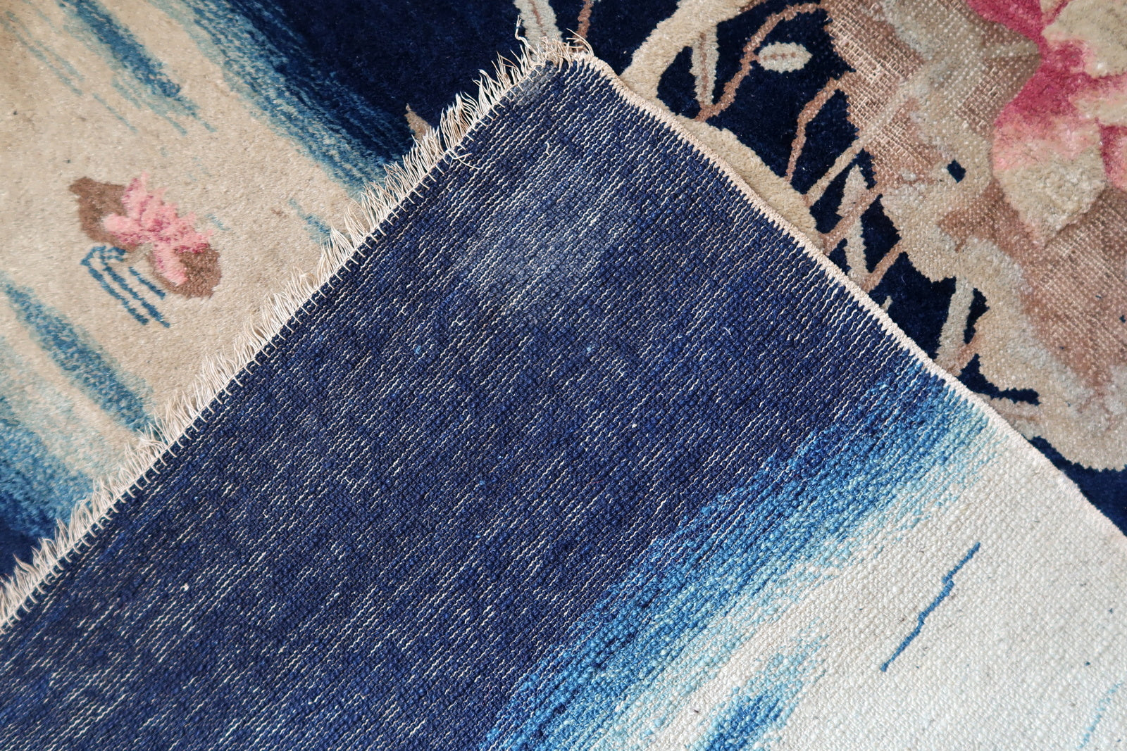 Antique Chinese rug back view, showing hand-knotted structure and weave