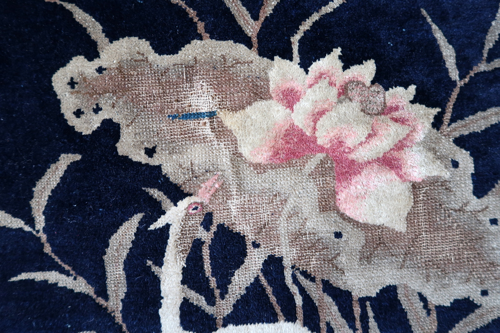 Antique Chinese rug back view, showing hand-knotted structure and weave