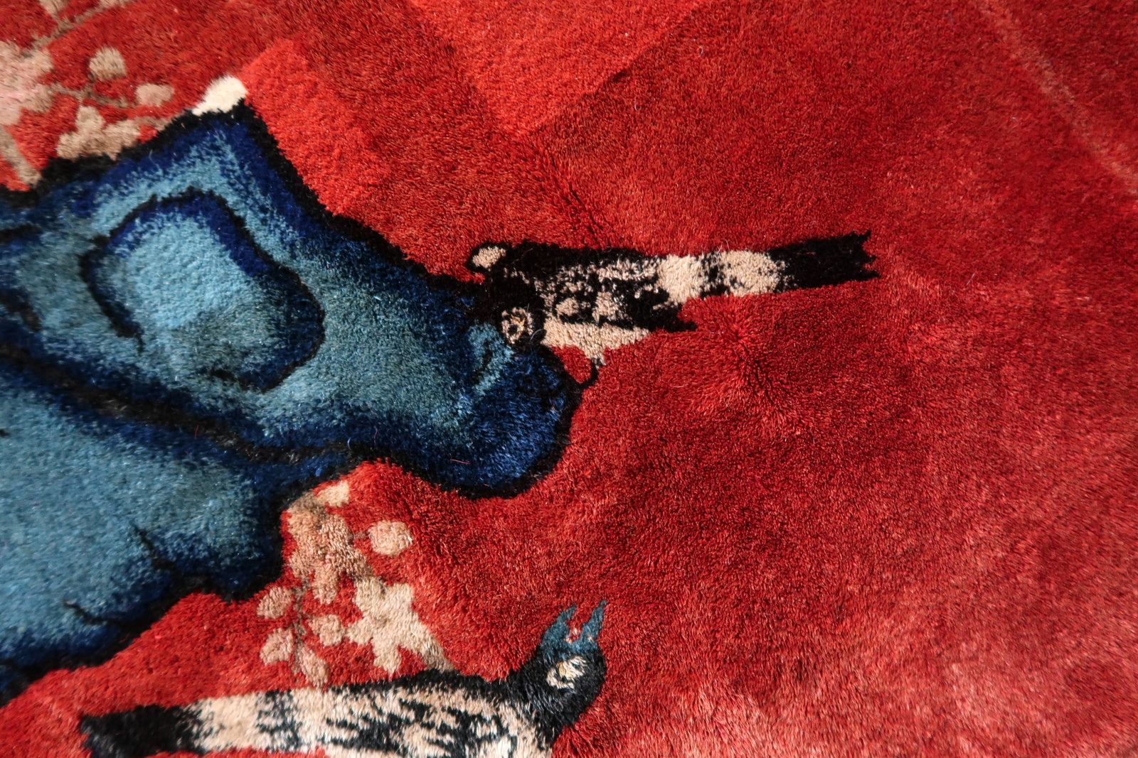 Antique Chinese Art Deco rug corner detail, showcasing craftsmanship and patina