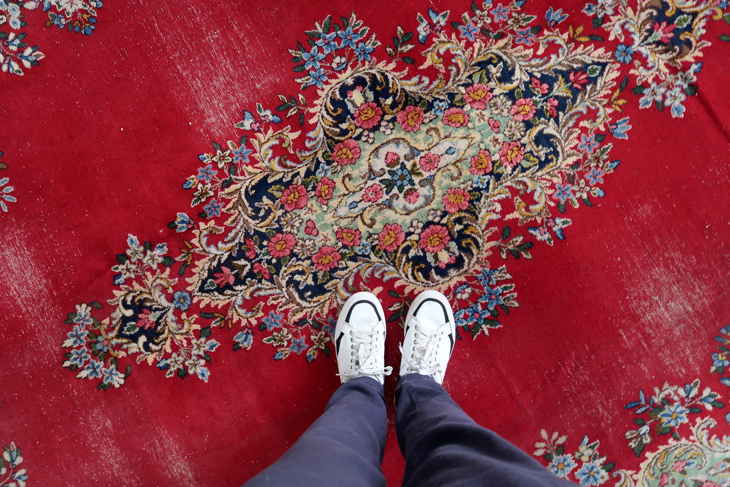 Vintage Kerman rug texture detail, dense pile with natural sheen