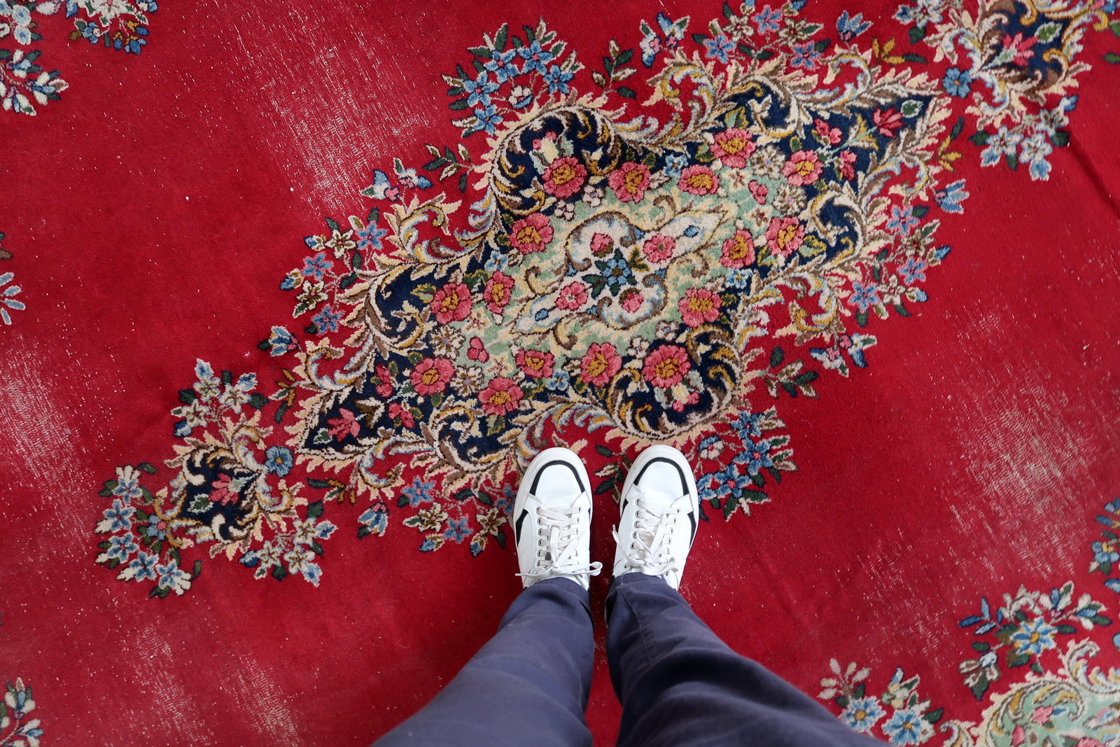 Vintage Kerman rug texture detail, dense pile with natural sheen
