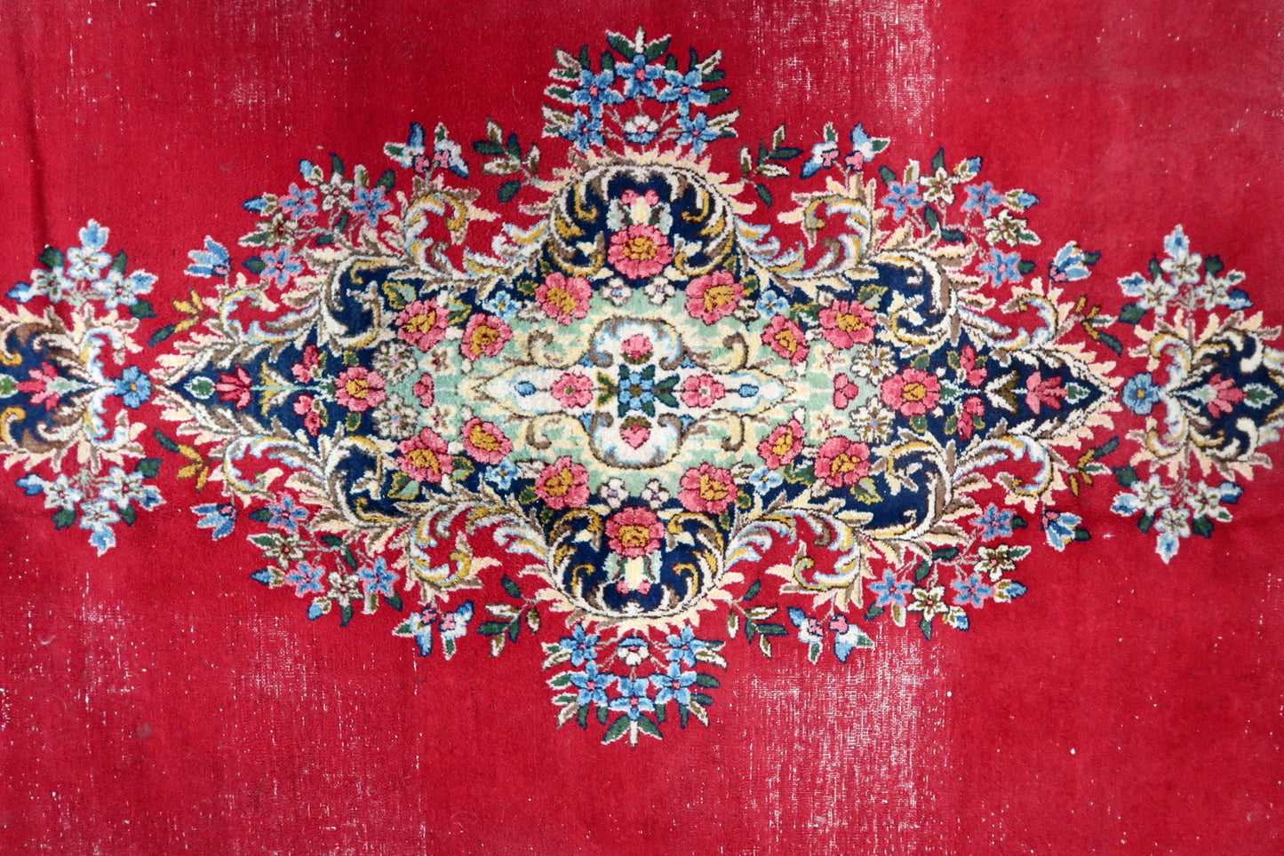 Antique Persian Kerman carpet, soft wool with intricate botanical motifs