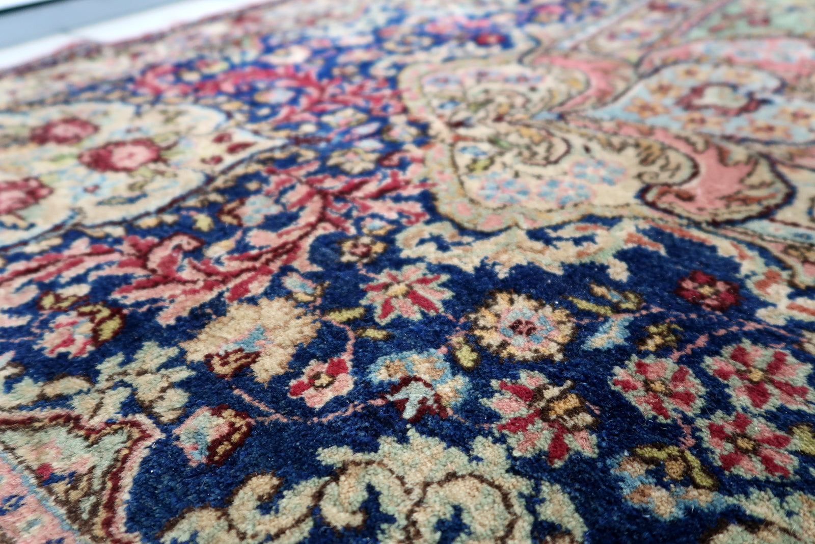Persian Kerman rug back view, showing tight weave and construction