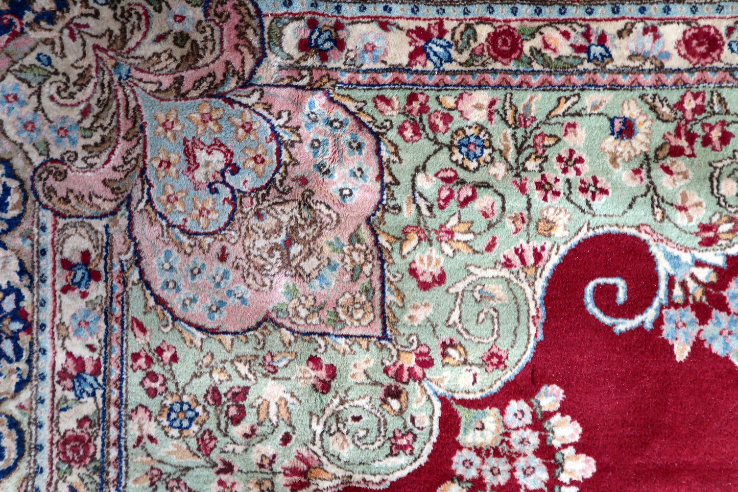 Antique Persian Kerman carpet, soft wool with intricate botanical motifs