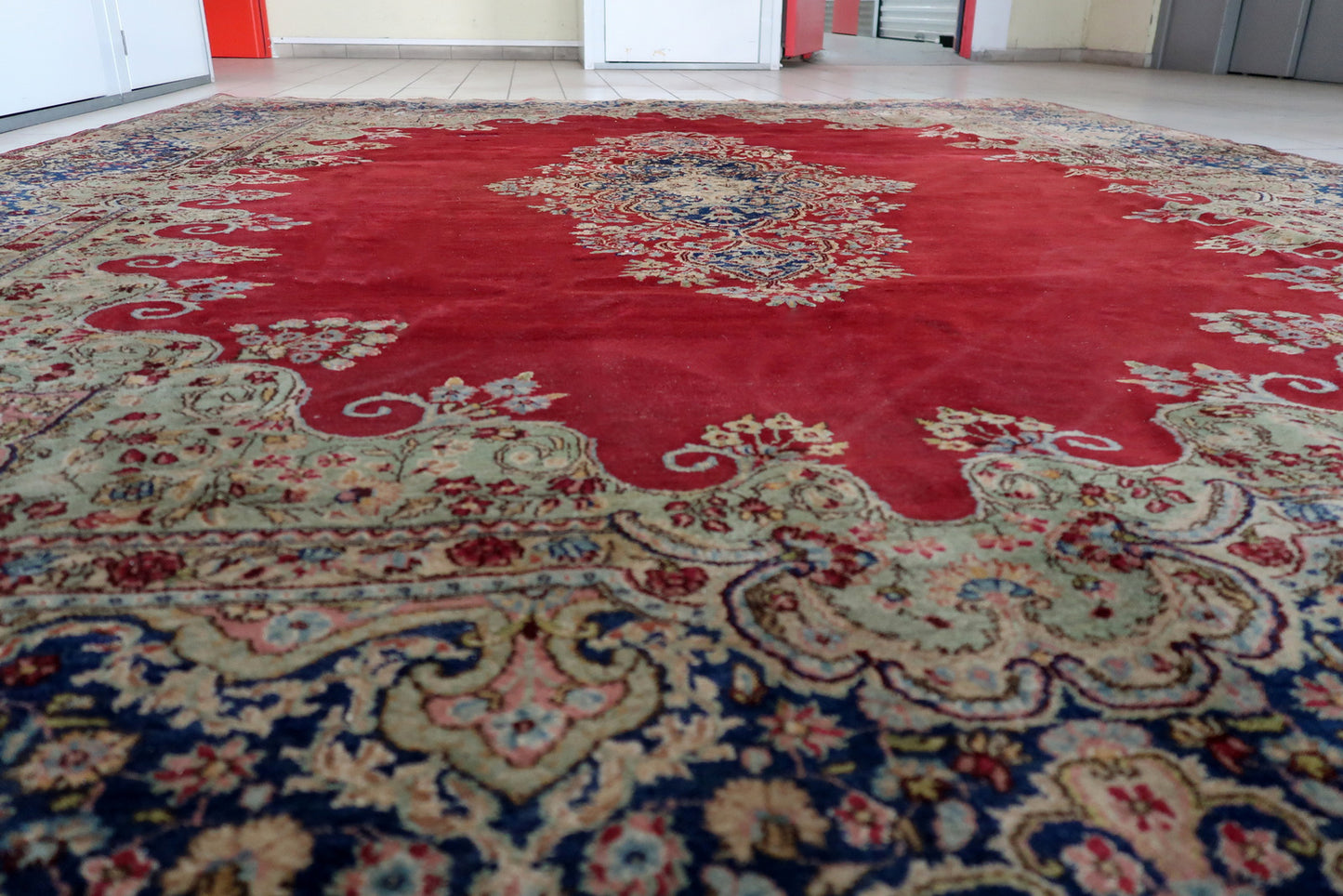 Vintage Kerman rug texture detail, dense pile with natural sheen