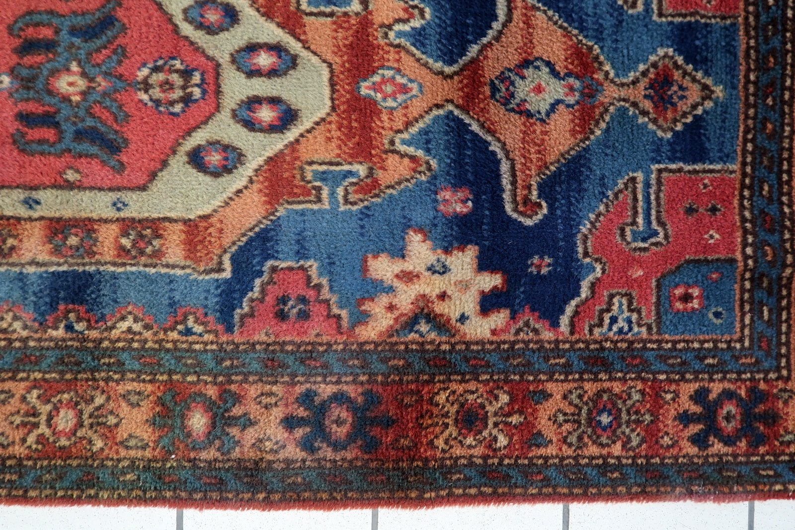 1950s German wool rug, tribal inspired design with repeating shapes