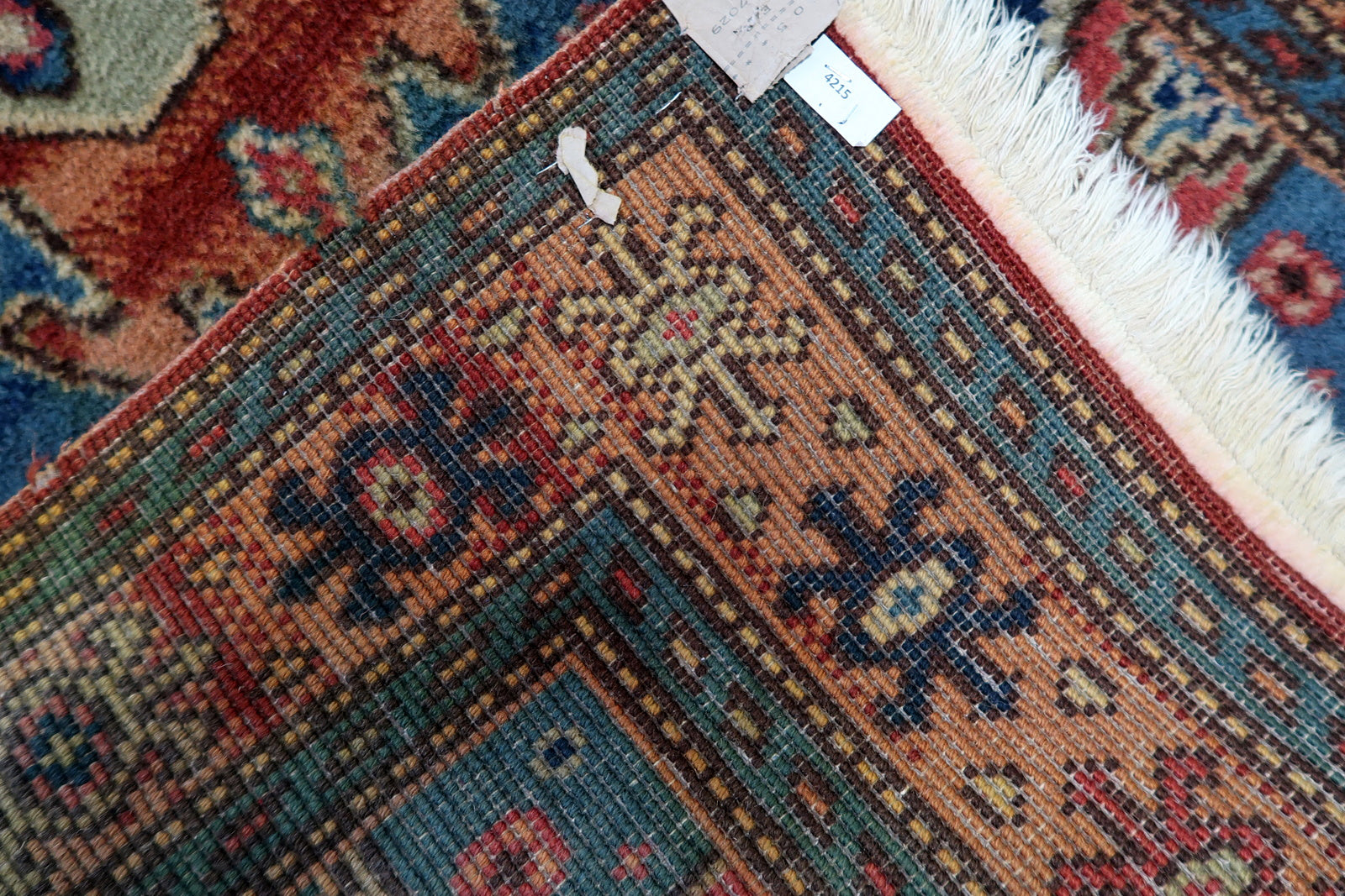 Vintage 1950s wool rug, geometric tribal motifs with structured layout