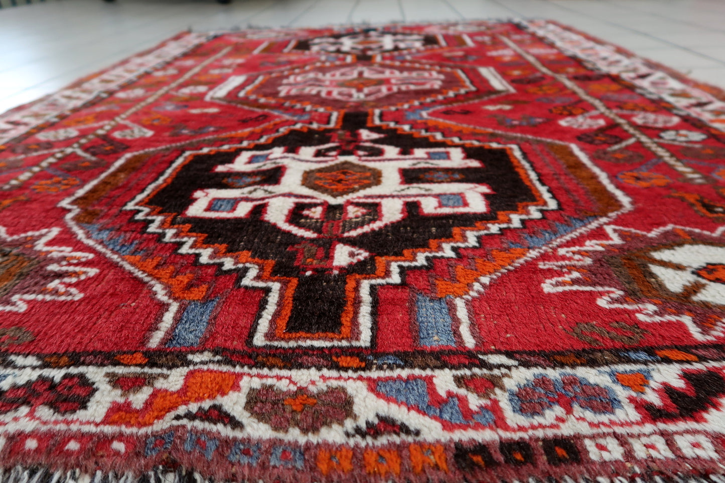 Persian Shiraz rug back view, showing hand-knotted construction