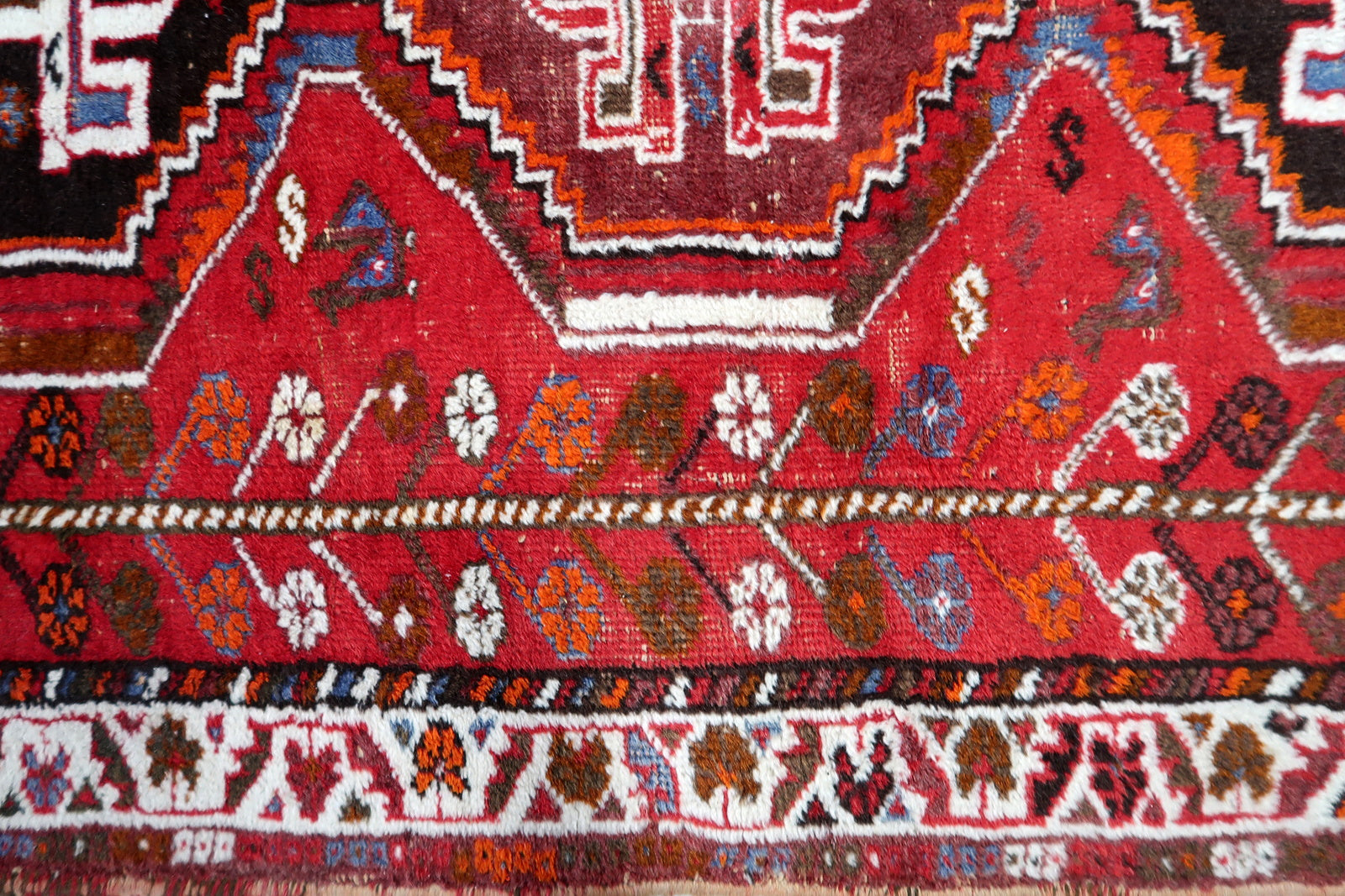 1940s Persian Shiraz rug, tribal wool carpet with geometric medallions