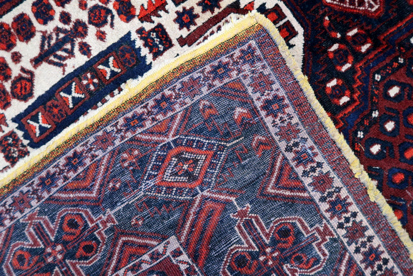 Persian Afshar rug back view, showing hand-knotted construction