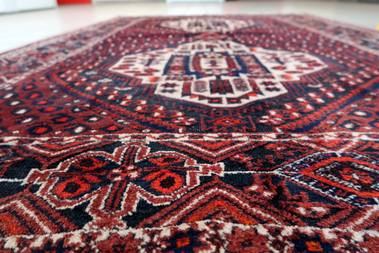 Vintage Afshar rug fringe detail, handmade wool with signs of age