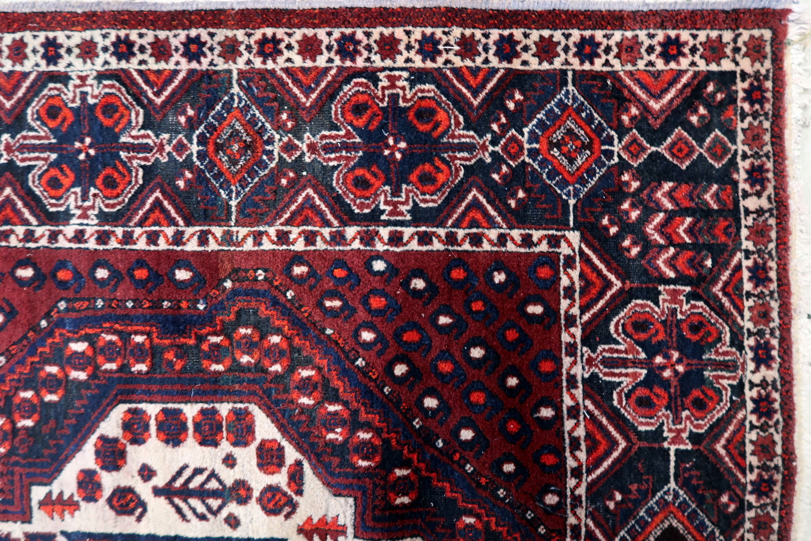 1950s Persian Afshar rug, geometric motifs with rich red and blue tones