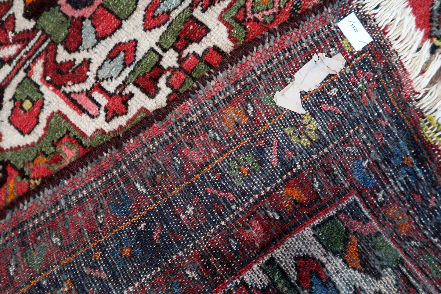 Small antique Persian Hamadan rug warm red tones with botanical medallion tribal style handwoven wool.

