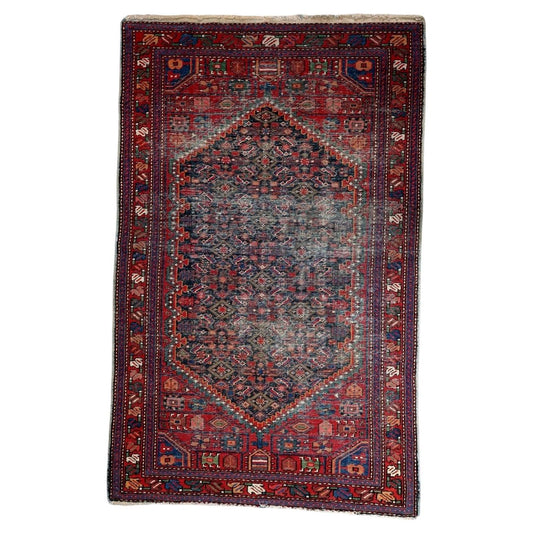 Handmade antique Persian Hamadan rug from the 1920s with distressed finish, featuring all-over Herati geometric design in deep red and navy blue, measuring 4 by 6.5 feet.

