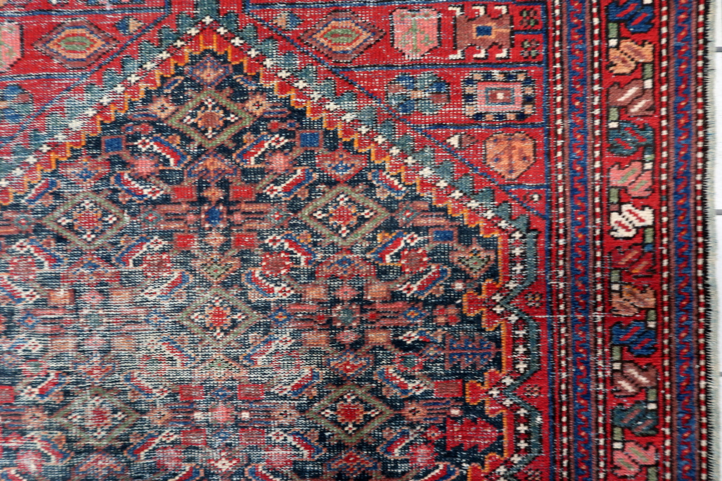 Full composition of a vintage Persian Hamadan carpet from the 1920s, 4 x 6.5 ft, with dense all-over Herati pattern and decorative border.

