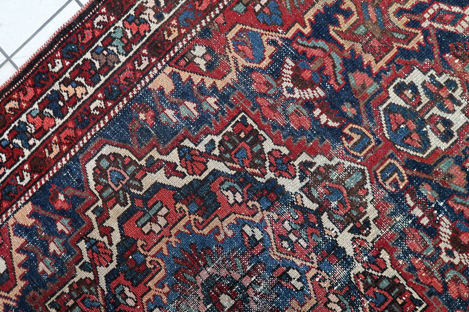 Small antique Persian Hamadan rug in rectangular format, featuring a striking medallion design and highly desirable vintage distressed patina.

