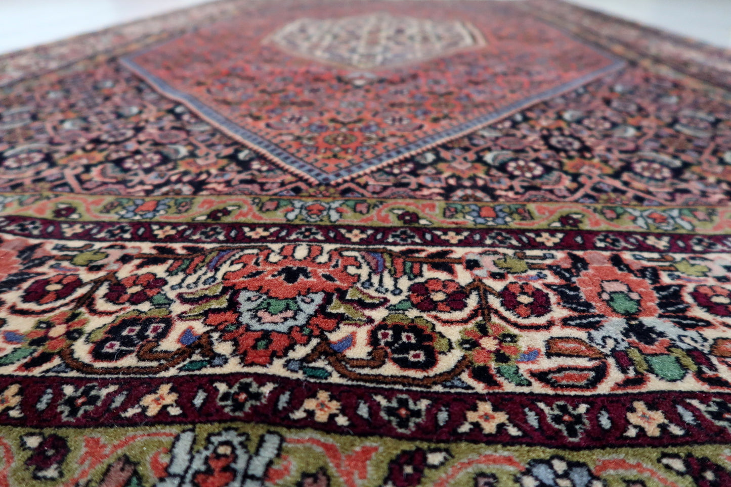 Medium vintage rug, ideal for office or living room warmth.

