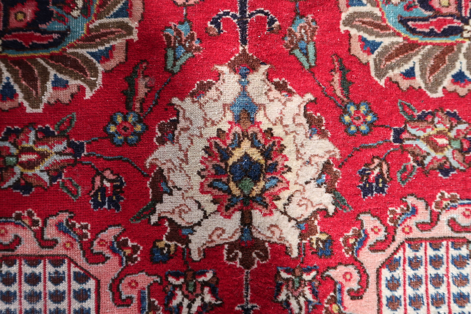 Antique Persian workshop rug from Tabriz, hand-knotted circa 1920s with asymmetric (Persian) knots in medium-fine density, featuring the most technically demanding allover Shah Abbasi format with no central medallion.

