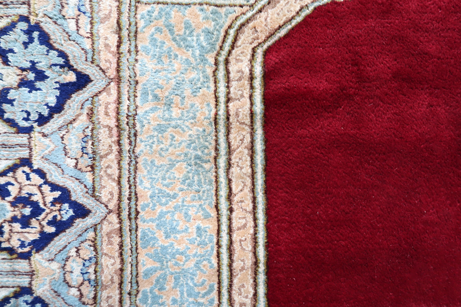 Antique Persian workshop rug from Kerman, hand-knotted circa 1930s with asymmetric (Persian) knots in fine density, featuring the most prestigious open field medallion format – a minimalist masterpiece requiring the weaver to trust the quality of the wool and color entirely.

